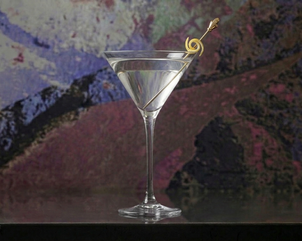Gin martini with lemon twist in a classic martini glass
