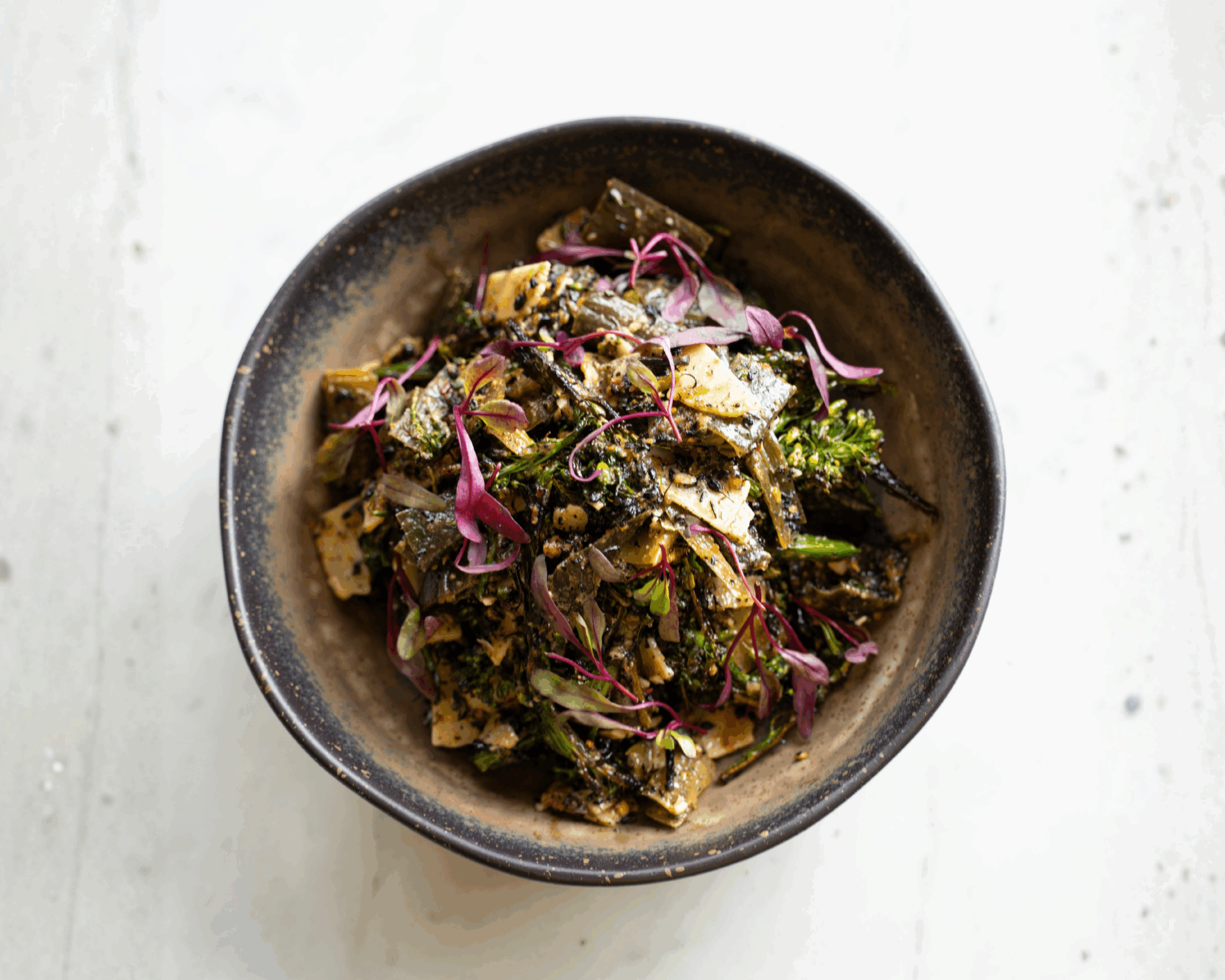 Charred broccolini Caesar salad with kimchi and chili crisp